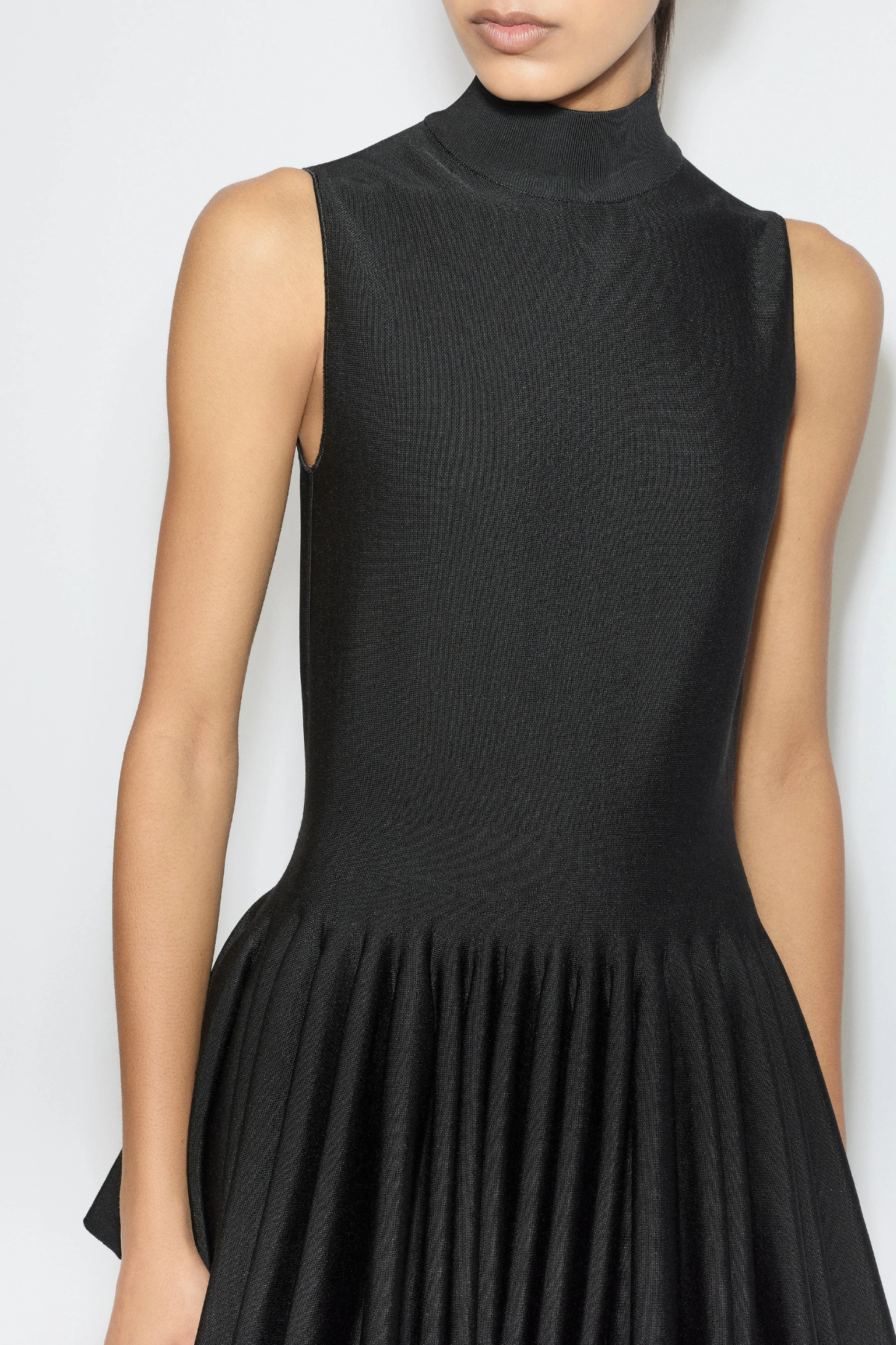 Pandita Sleeveless Peplum Top