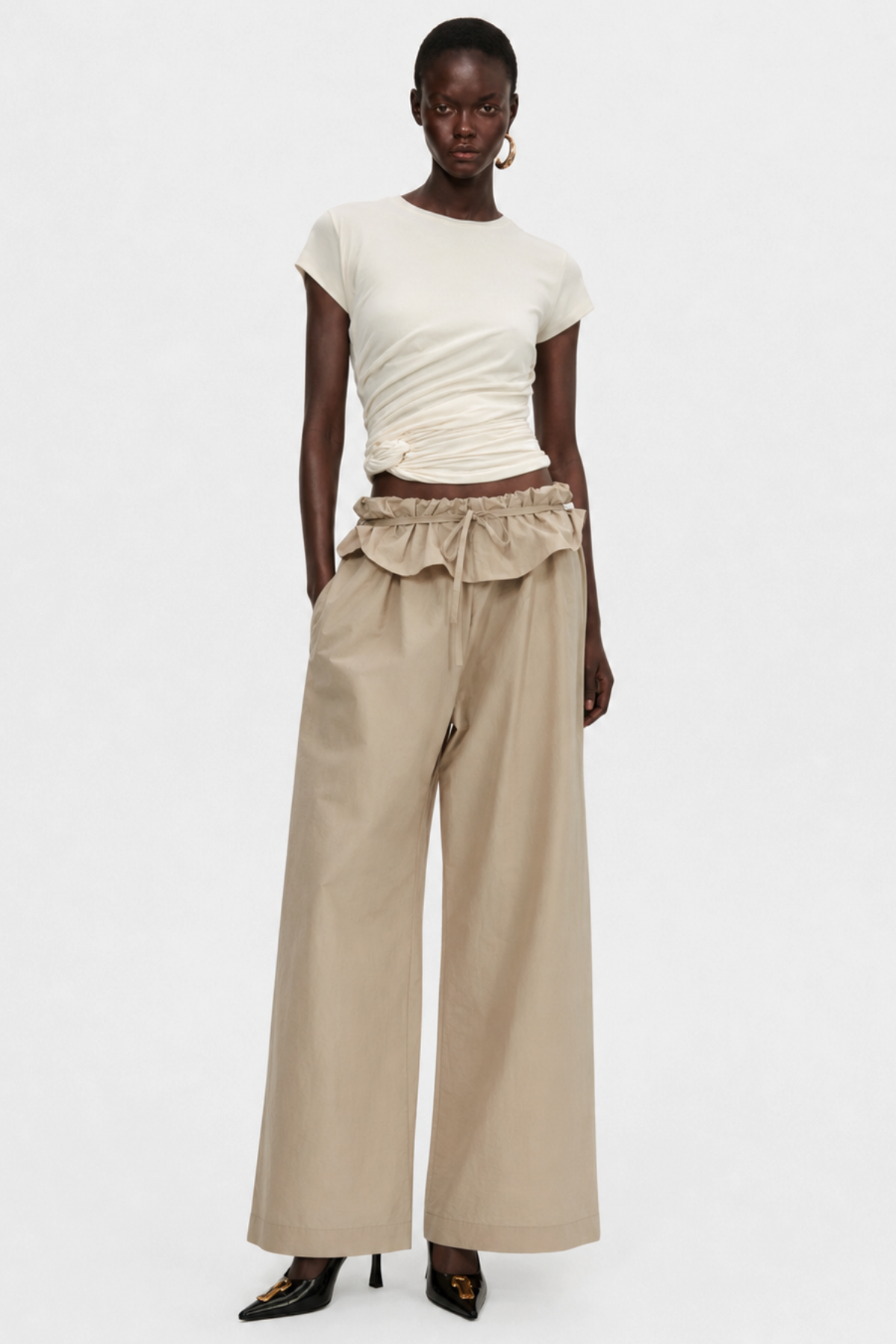 Amare Low-rise Ruffle Waist Trousers - Beige