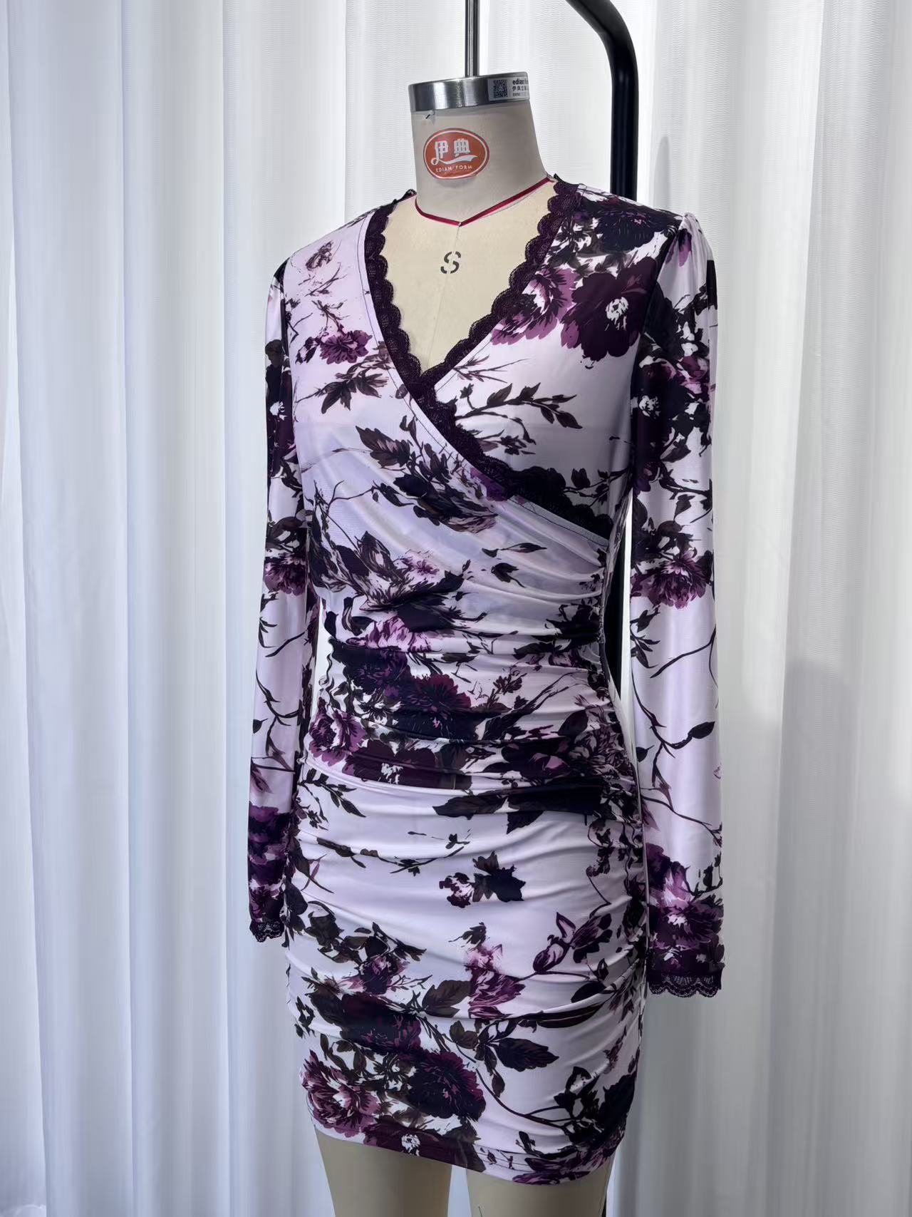 Lace-trimmed printed long-sleeved V-neck bodycon mini dress