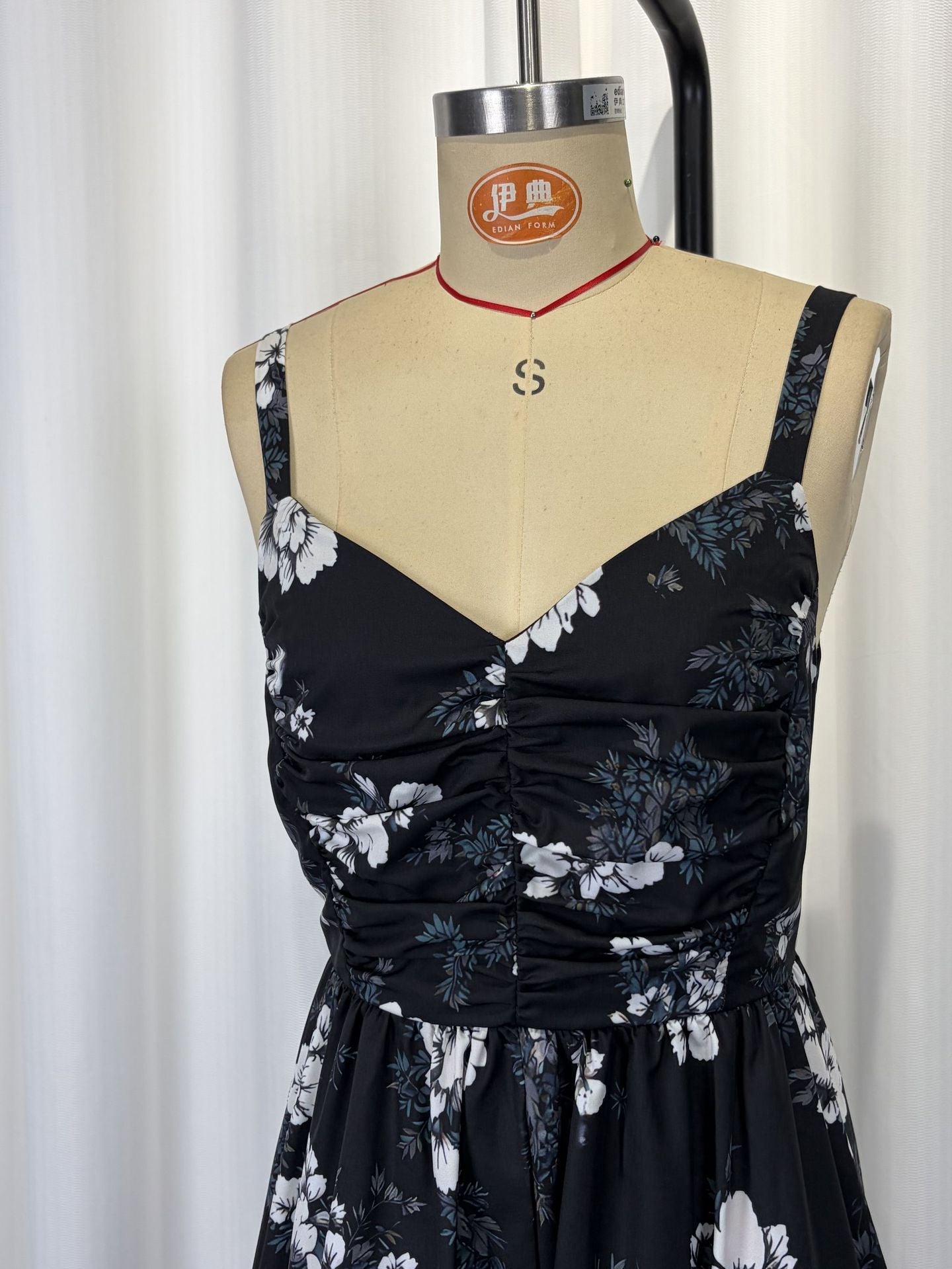 black Printed halter midi dress with irregular wave hem