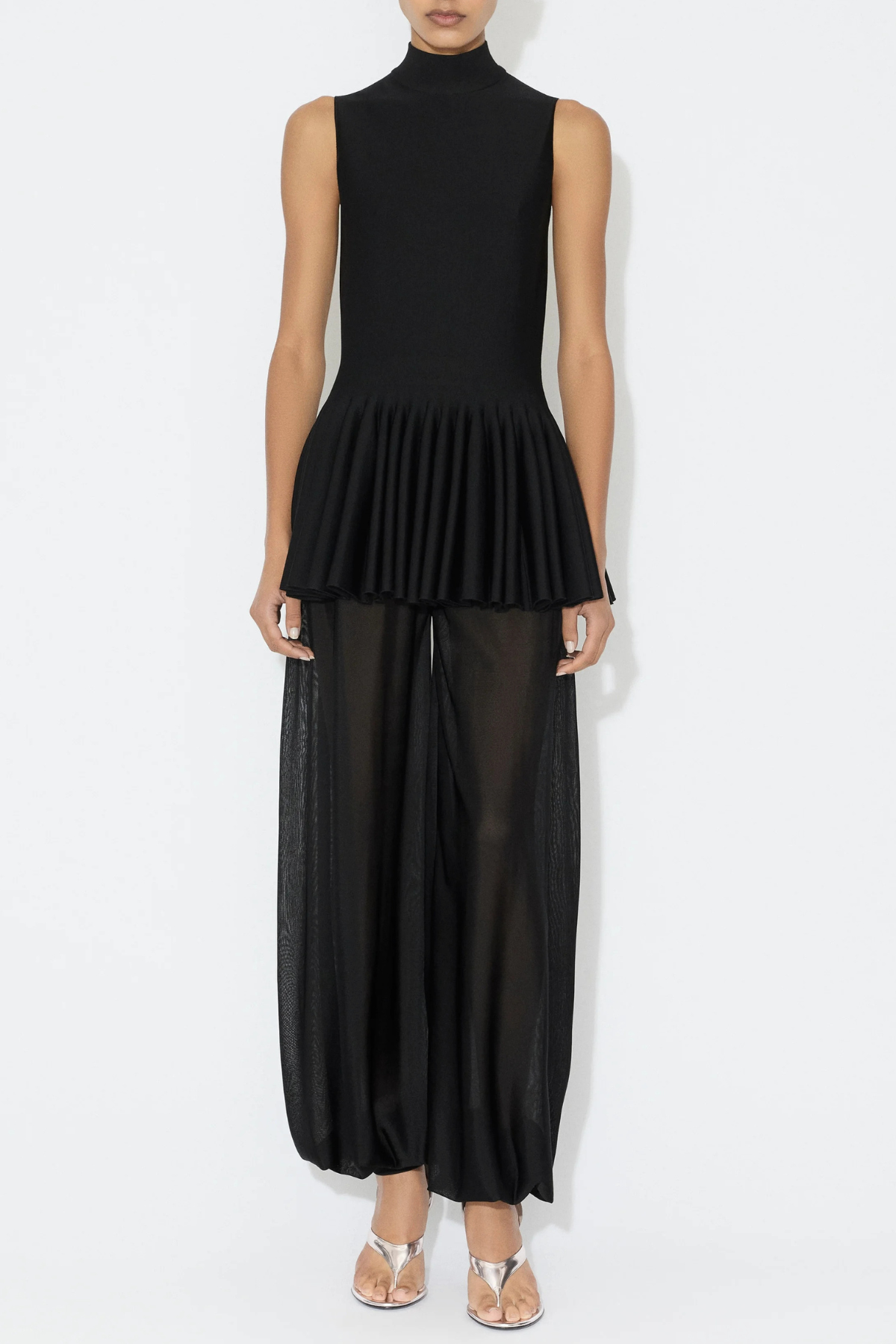 Pandita Sleeveless Peplum Top