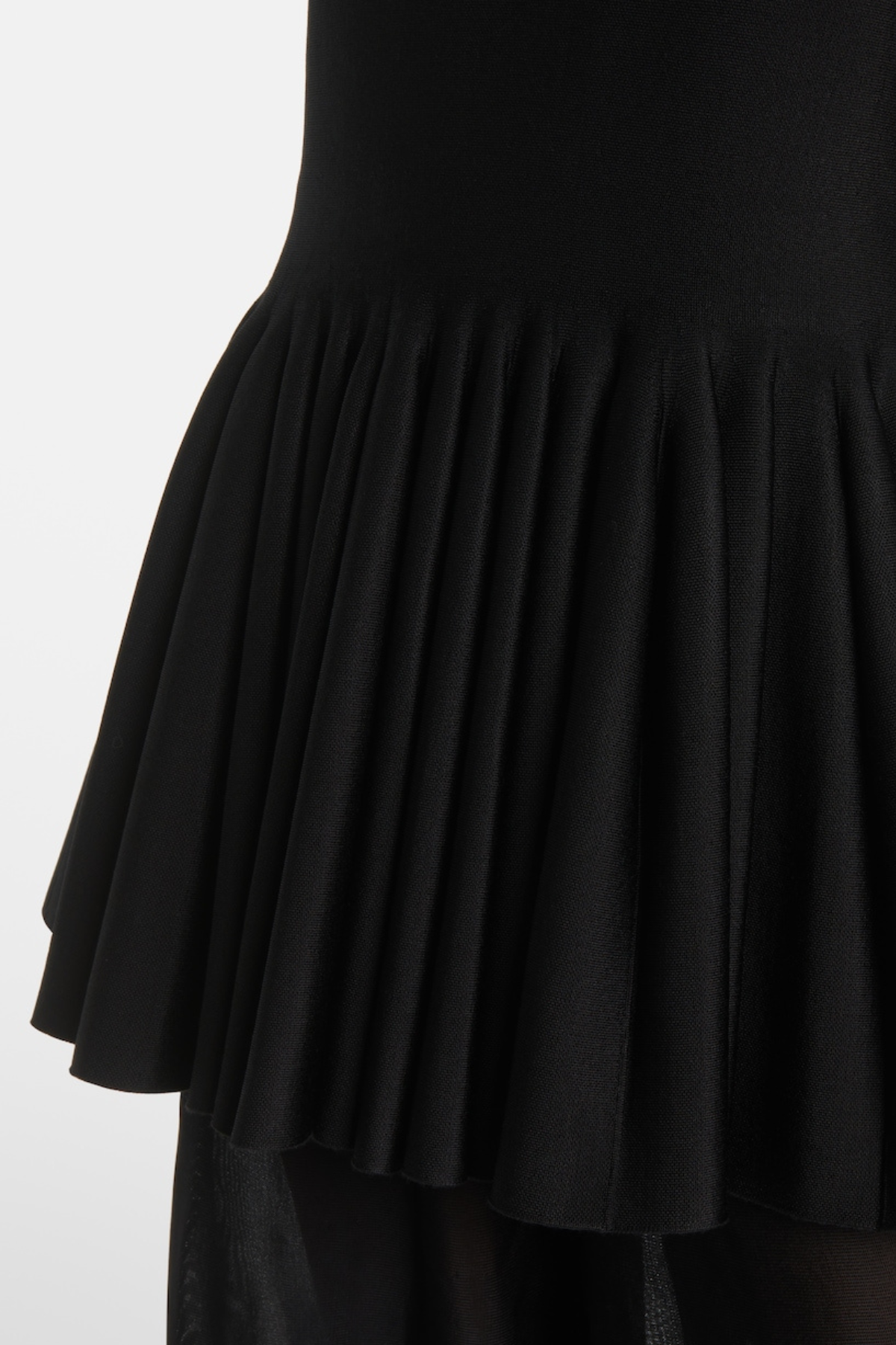 Pandita Sleeveless Peplum Top