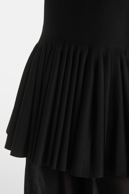 Pandita Sleeveless Peplum Top