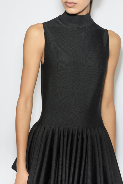 Pandita Sleeveless Peplum Top
